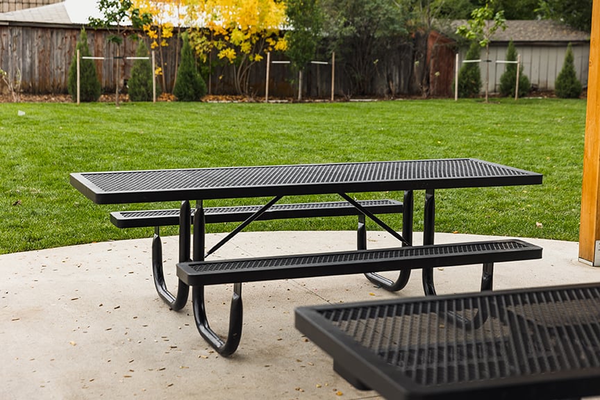 Regal Table with Centered Seats in a park